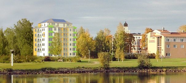 Passivhus med guldvittring vid Ljusnans strand