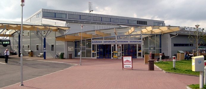 Flygplats hotar att stämma staten